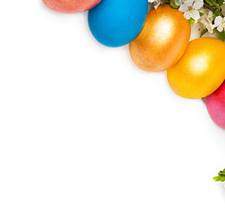 Easter background with eggs and spring flowers, text space