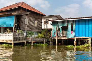 Slum on dirty canal in Asia