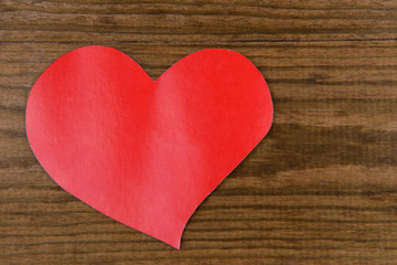 Paper hearts on wooden  background
