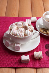 Cups of hot chocolate with marshmallows
