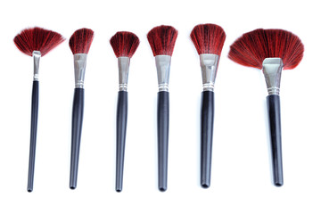 Black make-up brushes isolated on white