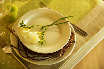 Beautiful holiday Easter table setting in green tones, close-up