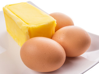 A group of chicken eggs and butter