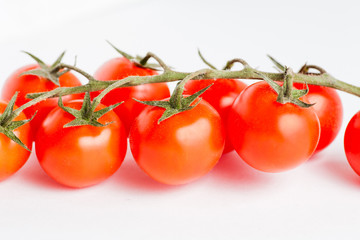 Fresh cherry tomatoes on stem