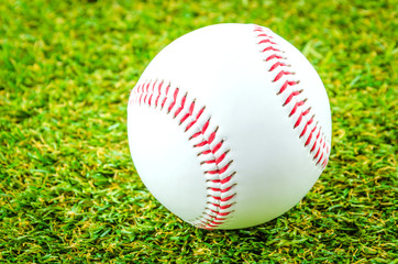 Baseball on green grass