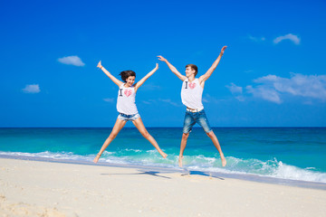 young loving couple on tropical beach
