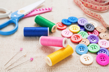 Sewing accessories on fabric