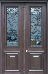 Wooden door with glass frames