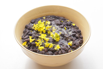 Bowl of beans with flowers