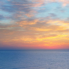 Naklejka na ściany i meble Beautiful sunset above the sea