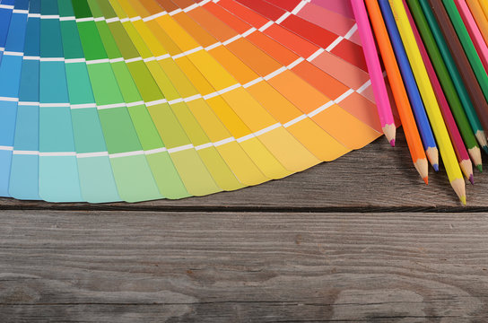Color palette on the wooden background