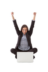 Young businesswoman sitting in yoga pose with laptop