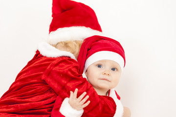 two little girls as Santa Clauses