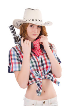 Redhead cowgirl with gun  isolated on white