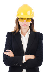 Pretty businesswoman with hard hat and in protective eyeglasses