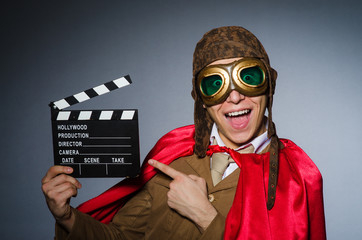 Funny pilot with goggles and helmet