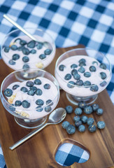 Vanilla yoghurt with fresh blueberries for breakfast