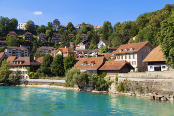 Fototapeta na wymiar Houses along the river Aare in Bern