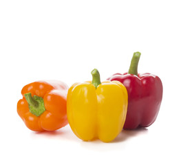 Sweet peppers, paprika on white, side view