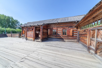 Wooden houses in the street in village. Museum of architecture 