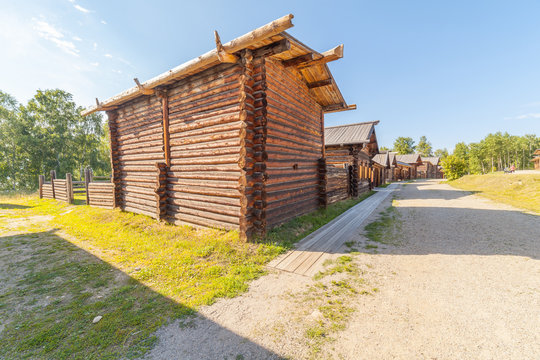 Wooden houses in the street in village. Museum of architecture 