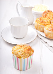 Savory cheese and bacon muffins on the white table