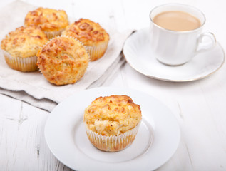 Savory cheese and bacon muffins on the white table