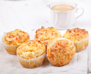 Savory cheese and bacon muffins on the white table