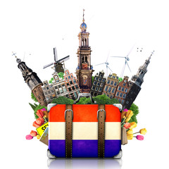 Fototapeta premium Holandia, zabytki Amsterdamu, podróże i walizka retro