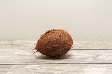 Coconuts close up on wooden board