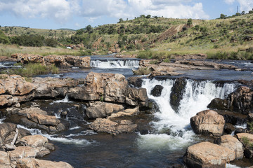 Fototapeta na wymiar waterfall at the bourkes potholes in south africa