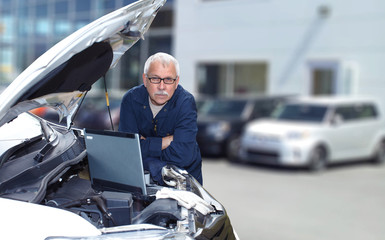 Mature auto mechanic.