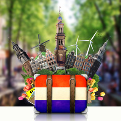 Fototapeta premium Holland, Amsterdam landmarks, travel and retro suitcase