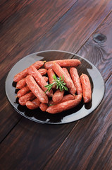 Smoked sausages on plate