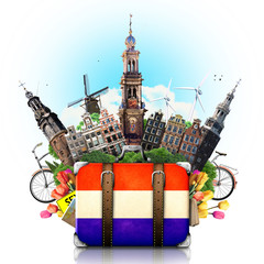 Obraz premium Holland, Amsterdam landmarks, travel and retro suitcase