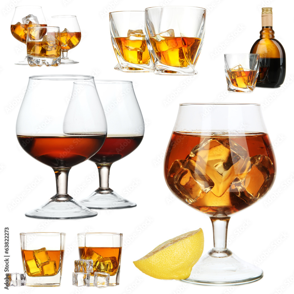 Wall mural collage of brandy glasses with ice cubes isolated on white