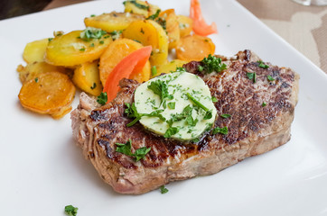 steak beef meat with tomato and french fries