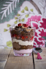 Chocolate cake dessert, yogurt and strawberries