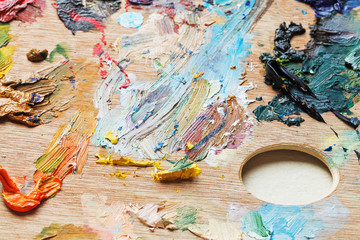 oil paint brush strokes on wooden artistic palette