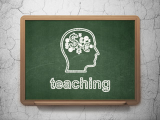 Education concept: Head With Finance Symbol and Teaching