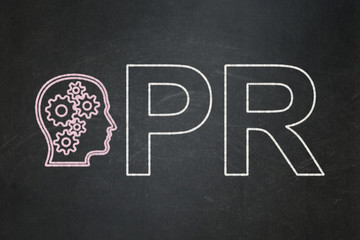 Advertising concept: Head With Gears and PR on chalkboard