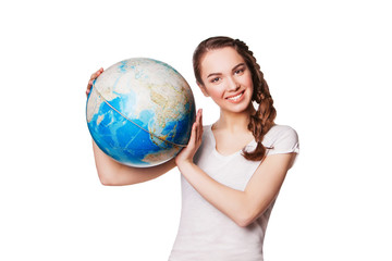 Pretty smiling young lady holding a world globe
