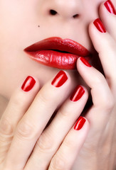 Sensual Woman Red Lips. Red Nail Polish