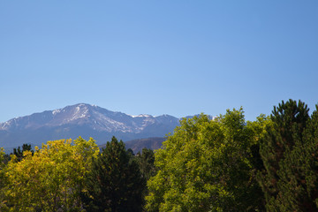 View on Highway in fall to Pikes Peak