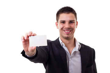 Young male holding a business card