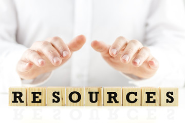 Businessman protecting his resources