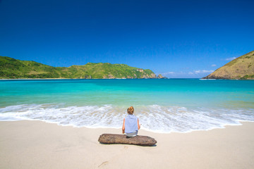 young woman on tropical beach