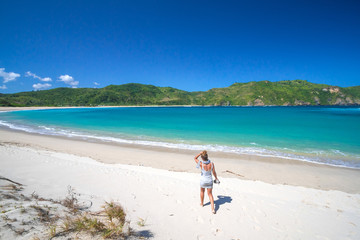 young woman on tropical beach