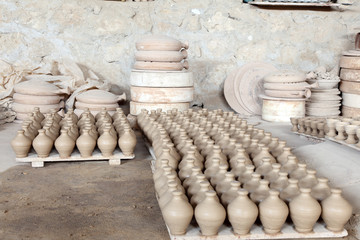 Hand made amphoras in a pottery. Bahrain, Middle East