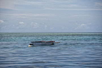 A bopat in turquoise tropical paradise island